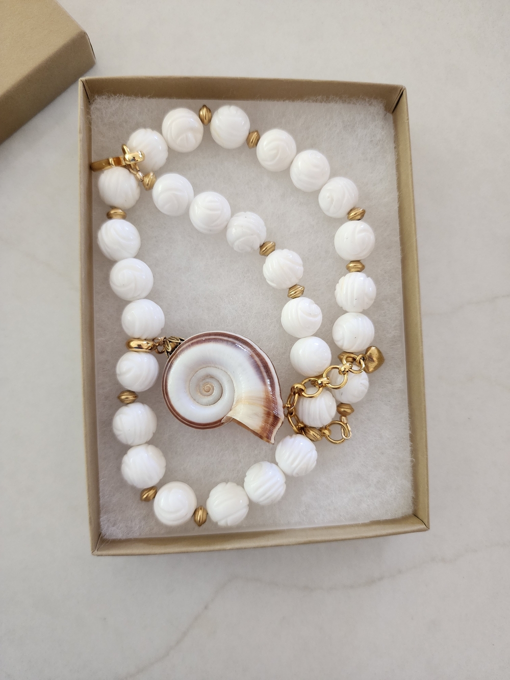 Brinker + Eliza White Beaded Necklace with Shell Spiral Pendant and Gold Accents